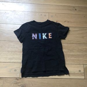 Black Nike tee with colorful letters